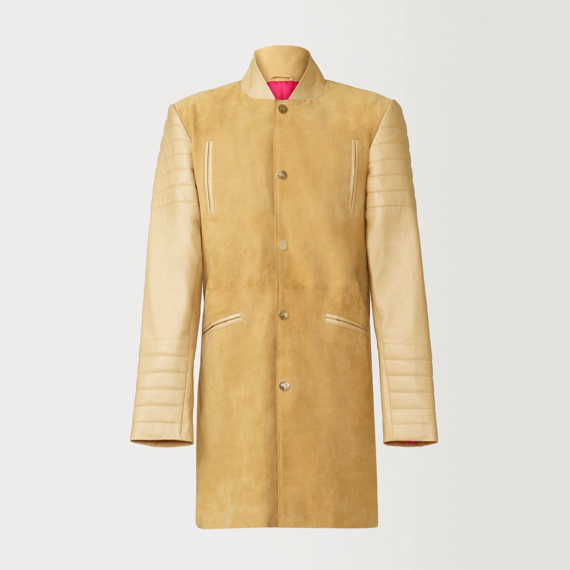 A Beautiful Suede Trench Coat, created by designer brand PRSVR. The PRSVR Lab Coat has a suede Body, and lambskin leather sleeves that show off a padded ribbed design on the shoulder and wrist of the sleeve.