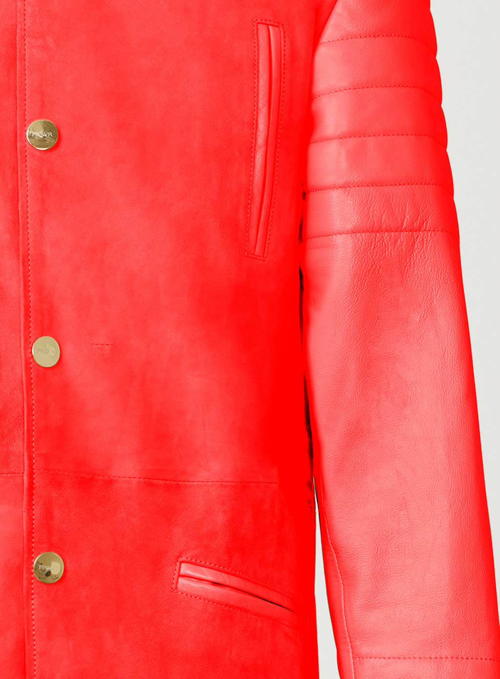 A Beautiful Black Suede Trench Coat, created by designer brand PRSVR. The PRSVR Lab Coat has a suede Body, and lambskin leather sleeves that show off a padded ribbed design on the shoulder and wrist of the sleeve. 