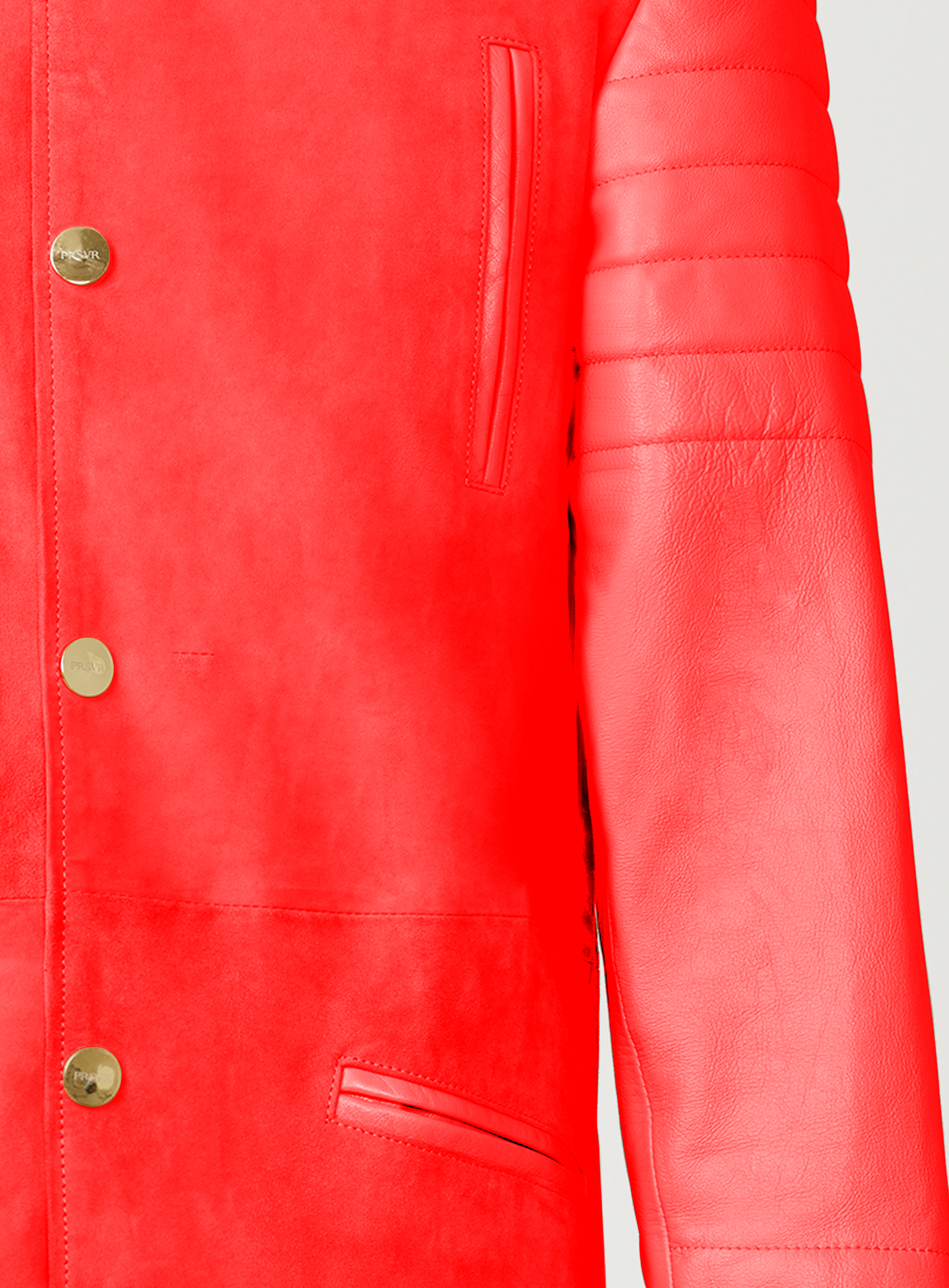 A Beautiful Black Suede Trench Coat, created by designer brand PRSVR. The PRSVR Lab Coat has a suede Body, and lambskin leather sleeves that show off a padded ribbed design on the shoulder and wrist of the sleeve. 